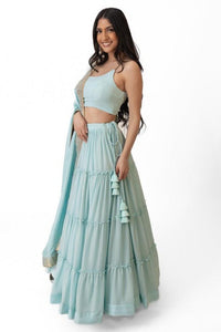 Elvia Sky Blue Shimmer Tiered Lehenga Choli Set with Gold Accents