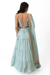 Elvia Sky Blue Shimmer Tiered Lehenga Choli Set with Gold Accents