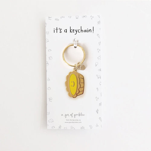 Dan Tat Egg Tart Enamel Keychain - Cultr. by Created for Culture asianowned aapimarketplace asianownedkids asianownedkidsproducts asianownedbrands