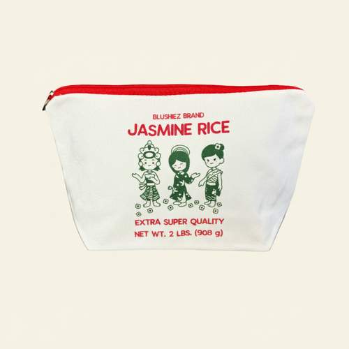 Jasmine Rice Zippered Canvas Pouch on clean warm ivory background, zero shadows — Blushiez editorial product photo