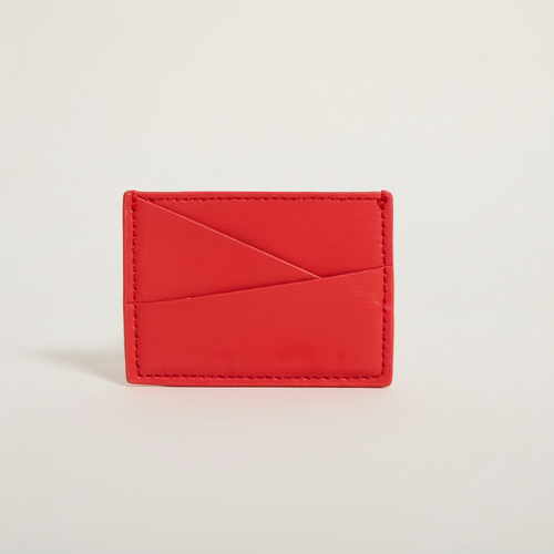 Gala Puzzle Cardholder (Poppy Red) on clean warm ivory background, zero shadows, no logos — CULTR editorial product photo