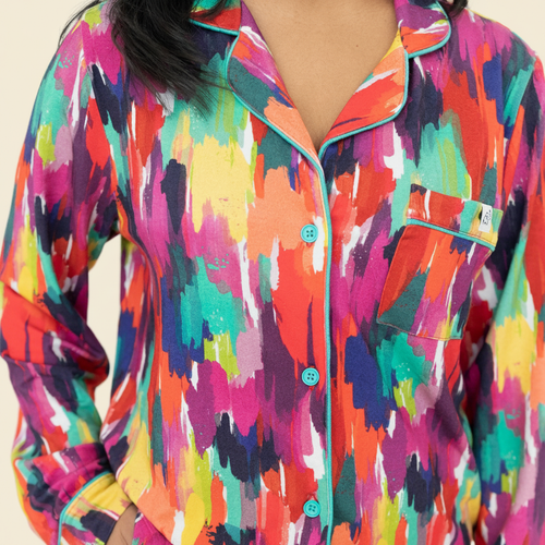 Adult Long Sleeve Button-Down Top – Holi Hues with model on ivory background