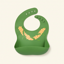Silicone Bib on clean warm ivory background, zero shadows — CULTR editorial product photo