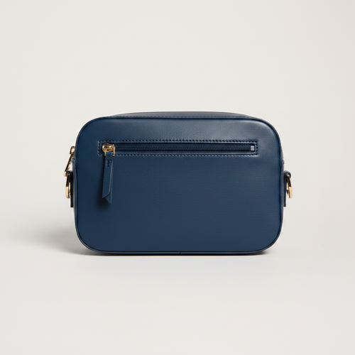 Gala Crossbody Camera Bag (Navy) on clean warm ivory background, zero shadows, no logos — CULTR editorial product photo