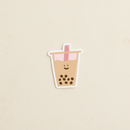 Boba Vinyl Sticker on warm ivory surface with soft diffused natural light — CULTR editorial product photo
