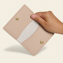 Gala Bifold Cardholder Pink Grey model with natural shadow on warm ivory background