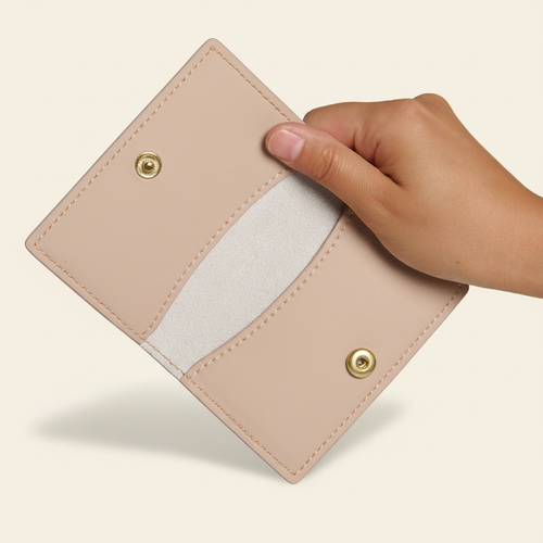Gala Bifold Cardholder Pink Grey model with natural shadow on warm ivory background