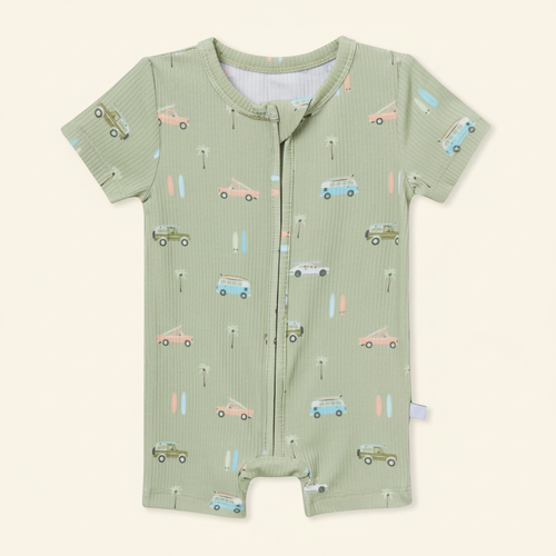 Short Zip Romper flat lay on clean warm ivory background, zero shadows — CULTR editorial product photo