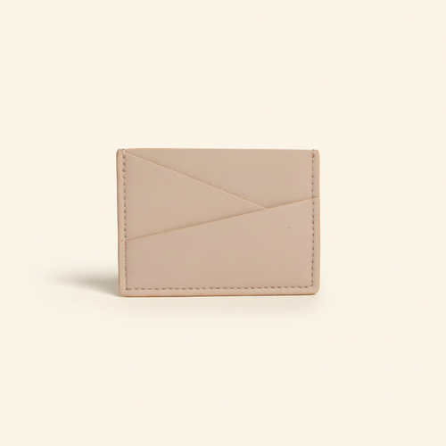 Gala Puzzle Cardholder Light Pink model with natural shadow on warm ivory background