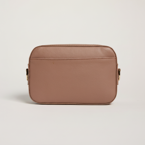 Gala Crossbody Camera Bag (Dusty Rose) on clean warm ivory background, zero shadows, no logos — CULTR editorial product photo