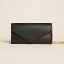 Gala Clutch / Wallet-on-Chain (Black) on clean warm ivory background, zero shadows, no logos — CULTR editorial product photo