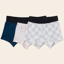 Boxer Brief 3-Pack flat lay on clean warm ivory background, zero shadows — CULTR editorial product photo