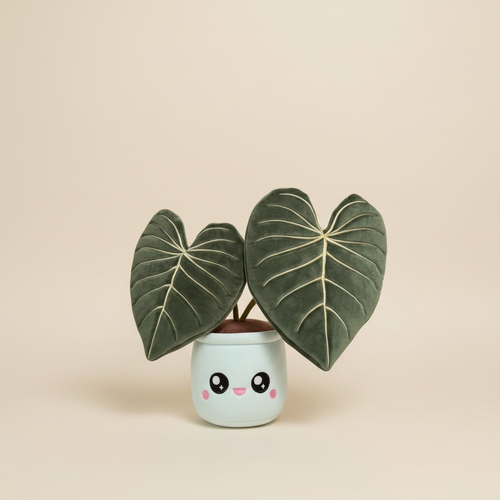 Philodendron Gloriosum Plushie on clean warm ivory background, zero shadows — Blushiez editorial product photo