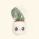 Monstera Deliciosa Albo Variegata Plush Keychain on clean warm ivory background, zero shadows — Blushiez editorial product photo