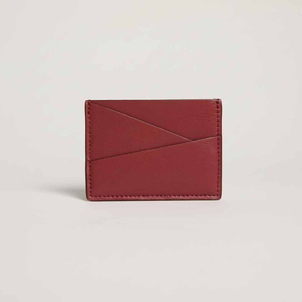 Gala Puzzle Cardholder (Wine) on clean warm ivory background, zero shadows, no logos — CULTR editorial product photo