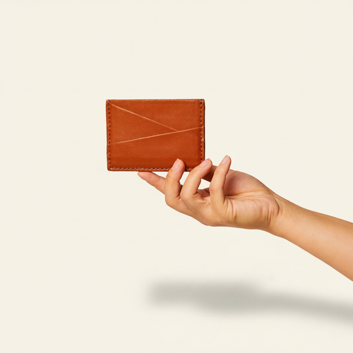 Gala Puzzle Cardholder Brown model with natural shadow on warm ivory background