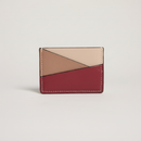 Gala Puzzle Cardholder (Red Mix) on clean warm ivory background, zero shadows, no logos — CULTR editorial product photo