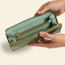 Cactus Long Wallet model with natural ground shadow on warm ivory background
