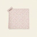 Swaddle Set flat lay on clean warm ivory background, zero shadows — CULTR editorial product photo