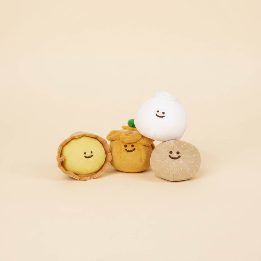 Mini Dim Sum Plushie Set on clean warm ivory background with flat ambient light — CULTR editorial product photo