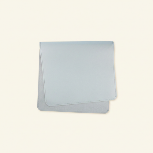 Vegan Leather Changing Mat Blue on clean warm ivory background, zero shadows — CULTR editorial product photo