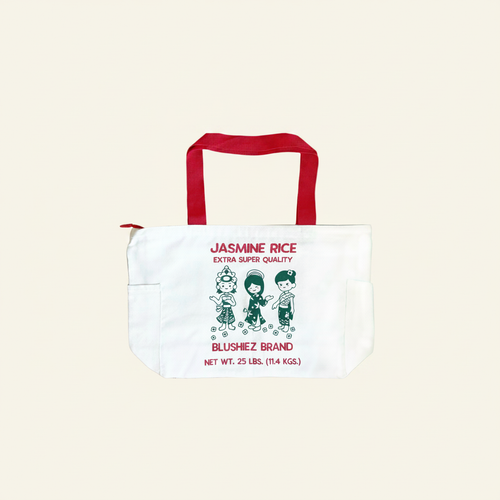 Premium Jasmine Rice Tote Bag on clean warm ivory background, zero shadows — Blushiez editorial product photo