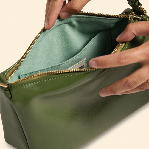 Cactus Shoulder Bag model with natural shadow on warm ivory background