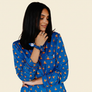 Adult Long Sleeve Button-Down Top – Blue Diya with model on ivory background
