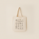 Dim Sum Cotton Tote on clean warm ivory background with flat ambient light — CULTR editorial product photo