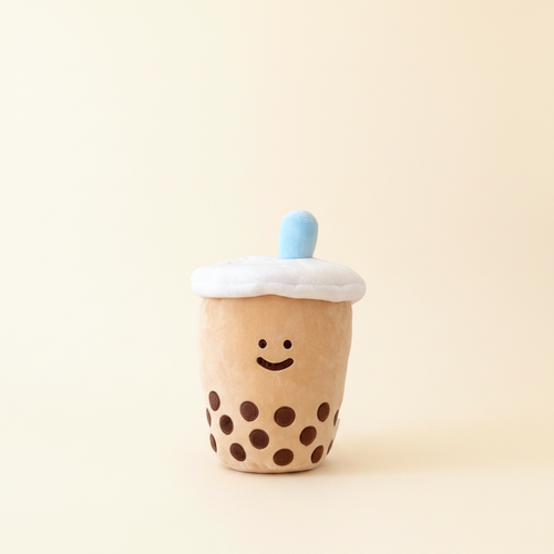 Boba Plushie on clean warm ivory background with flat ambient light — CULTR editorial product photo