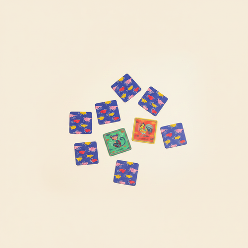 Chinese Vietnamese Zodiac Memory Match Game on clean warm ivory background, zero shadows — Bo & Mei editorial product photo