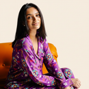 Adult Long Sleeve Button-Down Top – Purple Rangoli with model on ivory background