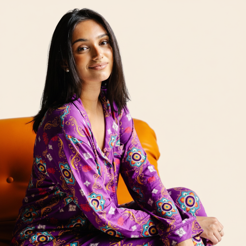 Adult Long Sleeve Button-Down Top – Purple Rangoli with model on ivory background