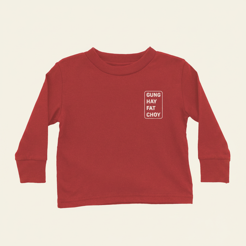 Lunar New Year Greeting Long Sleeves (Toddler) flat lay on clean warm ivory background, zero shadows — CULTR editorial product photo
