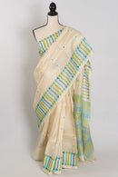 Rini: Cream Tussar Silk Saree with Blue & Green Motifs | Silk Mark Certified